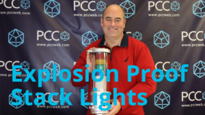 engineer holding explosion proof stack light